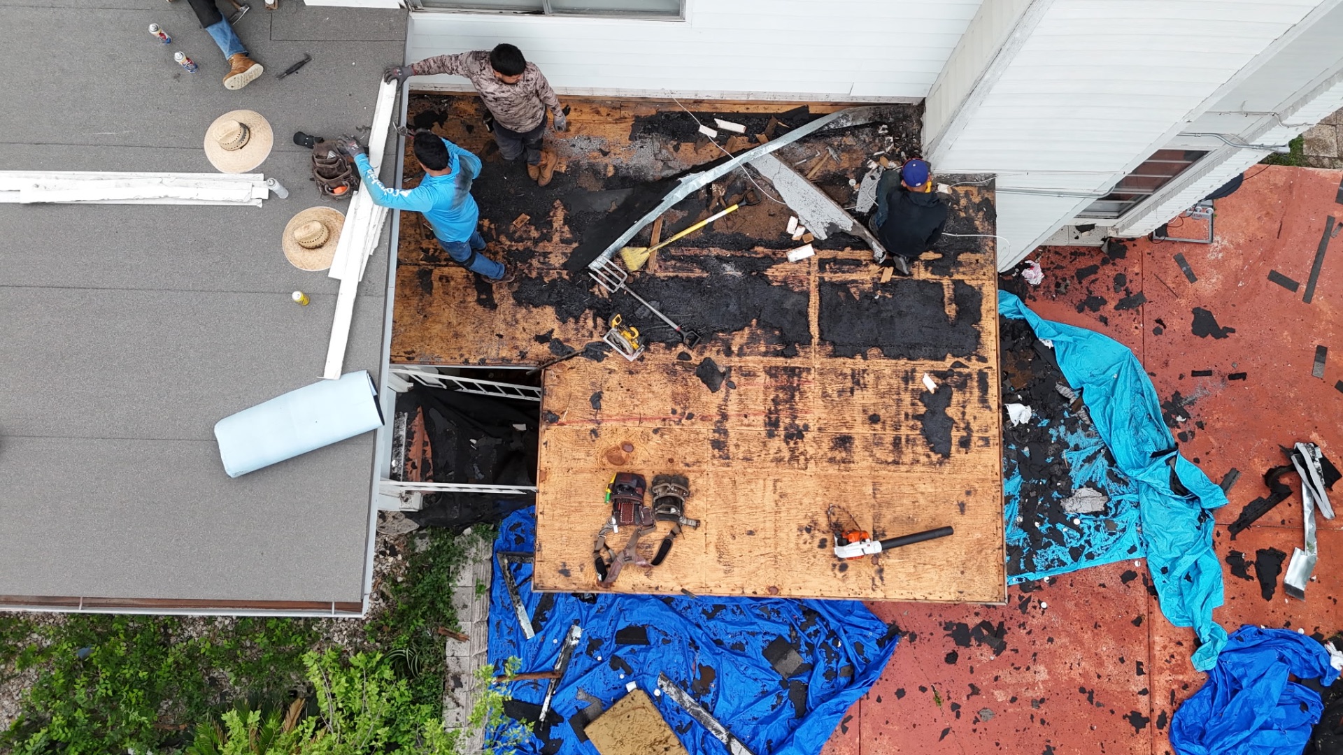 Tear-off and decking inspection in progress